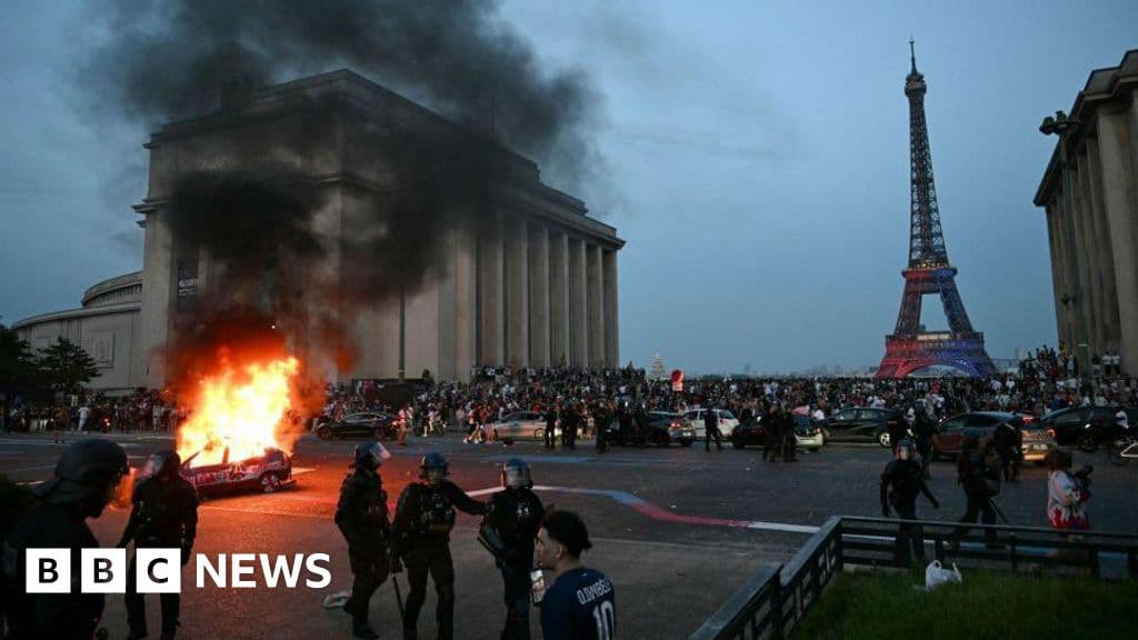 Hundreds arrested and dozens of police injured after Champions League riots in France - BBC