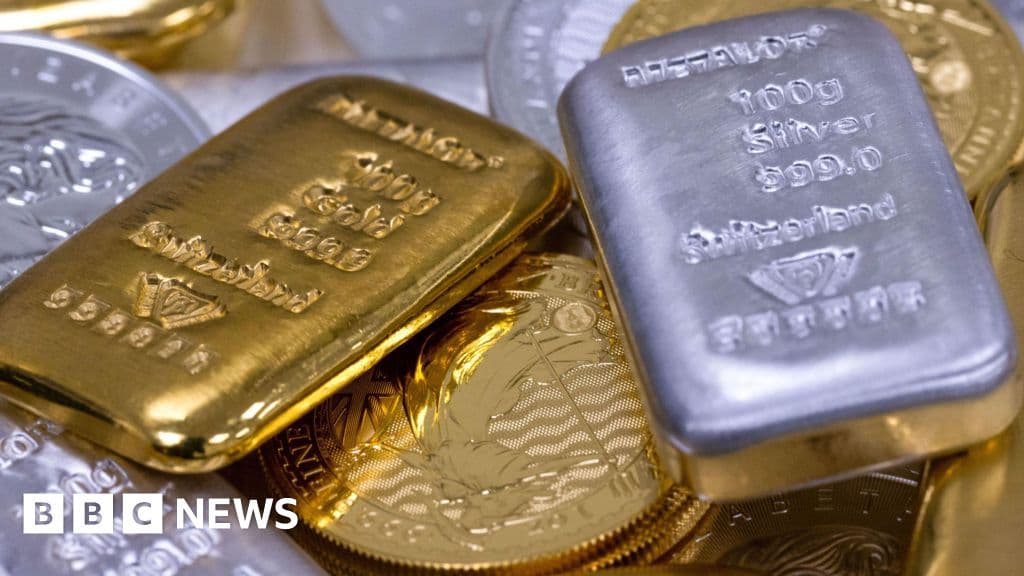 Gold and silver see rollercoaster end to blockbuster year - BBC