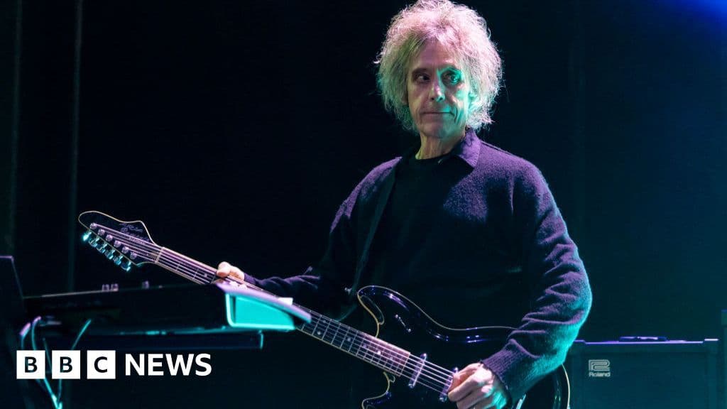 The Cure: Guitarist and keyboard player Perry Bamonte dies aged 65 - BBC