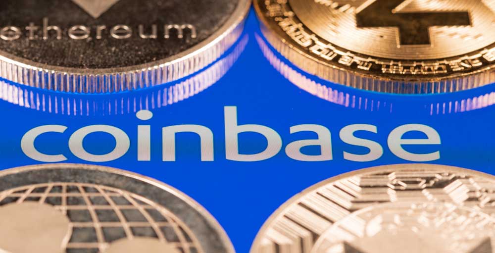 Coinbase Hit With Double Downgrade Ahead Of Tough Earnings Test - Investor's Business Daily